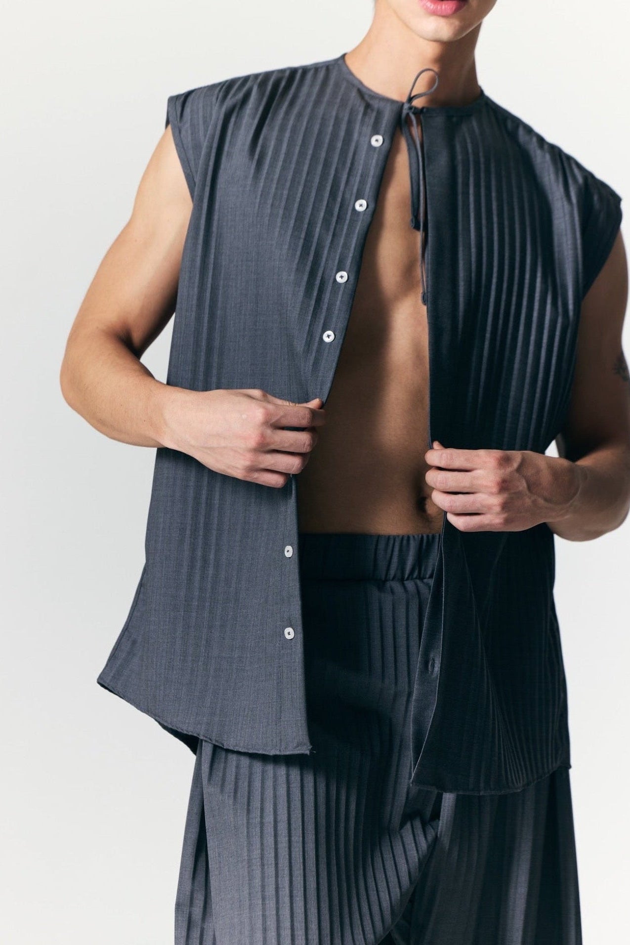 The Pleated Shirt
